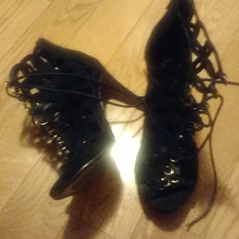 XO high heel shoes size 7.5. peep toe bootie about 3 to 4 in. heel black lace up